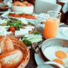 fried egg beside bread platter